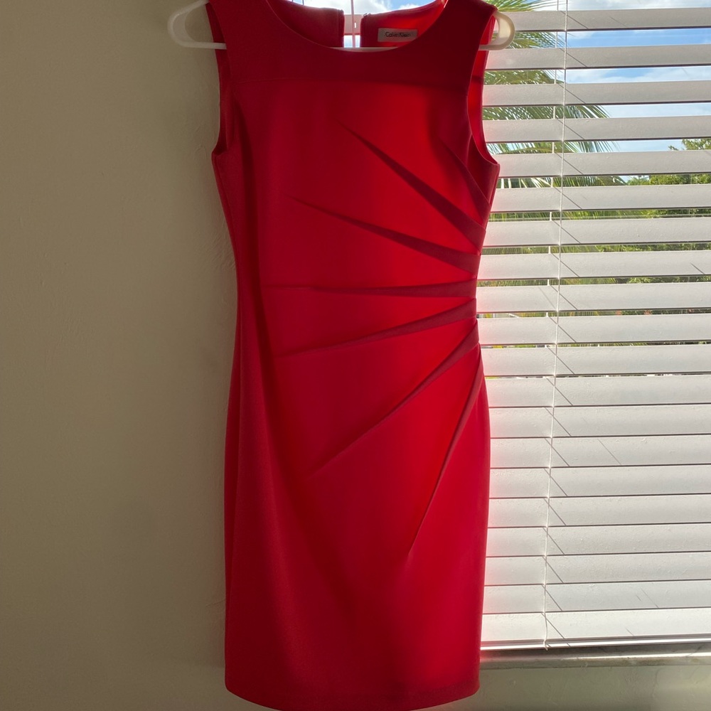 Calvin Klein coral knee length dress.
